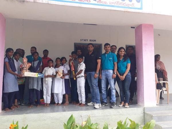 Volunteers and teachers at a school handover in Nagarkurnool district