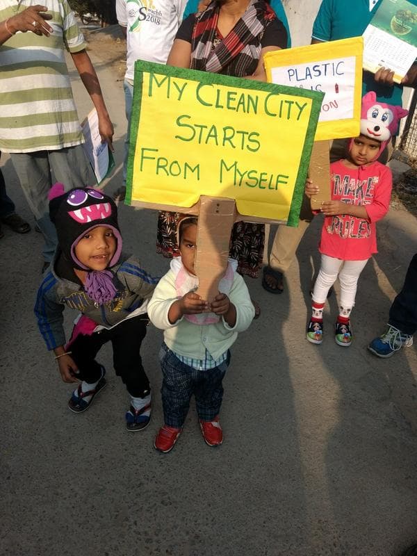 TechieRide members walking in a clean city and plastic awareness rally